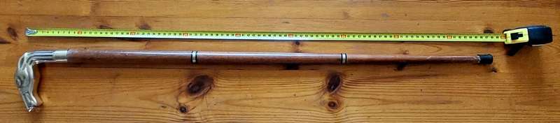Vintage walking stick with brass crutch in shape of a horse's head