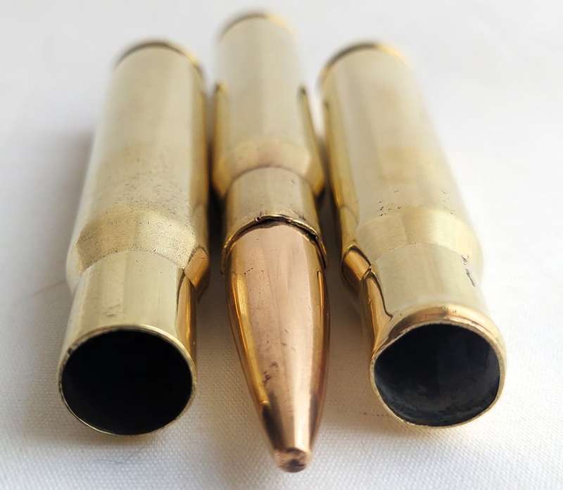 1 Set of 3 - Off Brass Shells - Caliber (12,7 mm) / .50 Browning - 2 off empty cartridges and 1 w...