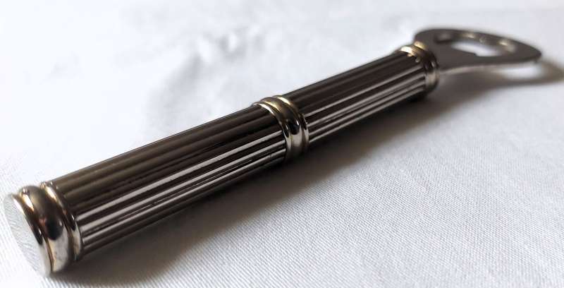 Rare Vintage Art Deco Styled Bottle Opener - Silver Plated inlaid handle with brass which is desi...