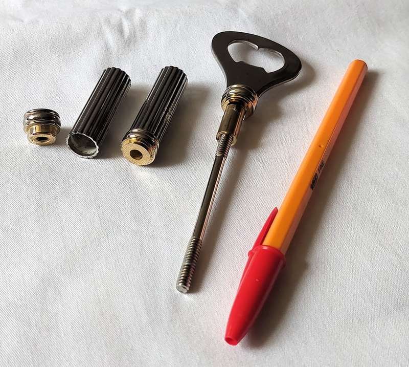 Rare Vintage Art Deco Styled Bottle Opener - Silver Plated inlaid handle with brass which is desi...