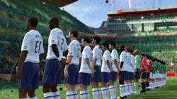 Two teams lined up, facing the crowd before a game in 2010 FIFA World Cup