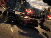 Three vehicle types racing side-by-side in Motorstorm Apocalypse