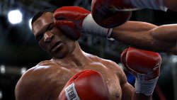 Mike Tyson taking a punch to the head from Ali in 'Fight Night Round 4'