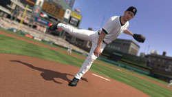 Pitcher following through with his motion towards home plate in MLB 2K10