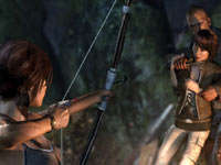 Lara Croft using her bow to save a captive in Tomb Raider