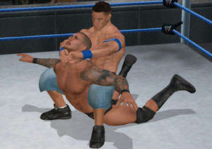 Cena locking a submission hold into place in WWE Smackdown vs Raw 2010 for Wii