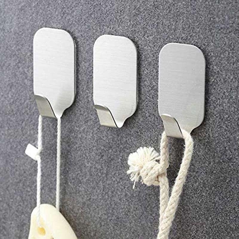 A Set Of 10 Sticky Stainless Steel Wall Brackets for Bathrobes