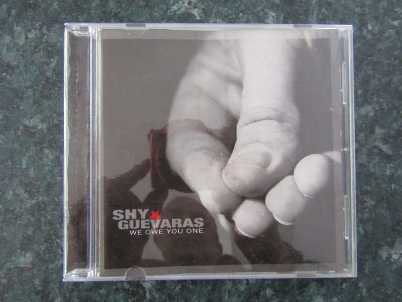 Shy Guevaras - We Owe You One (CD)