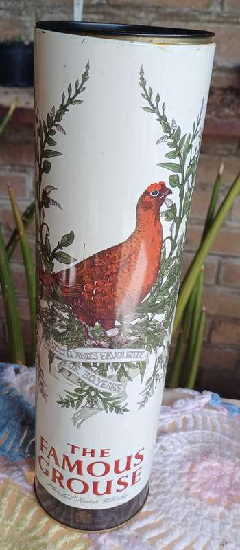 The famouse grouse tin (empty)