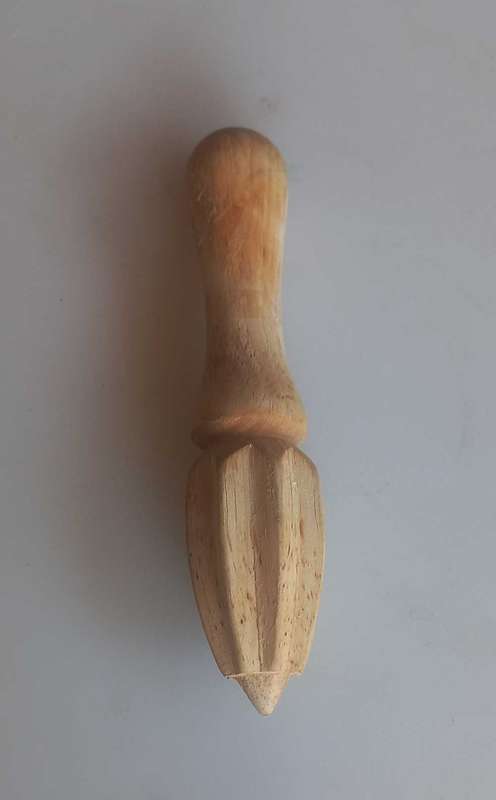 Wooden hand citrus juicer