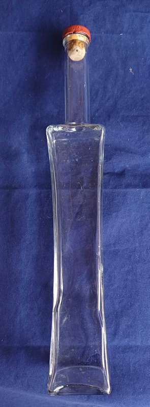 Tall glass bottle