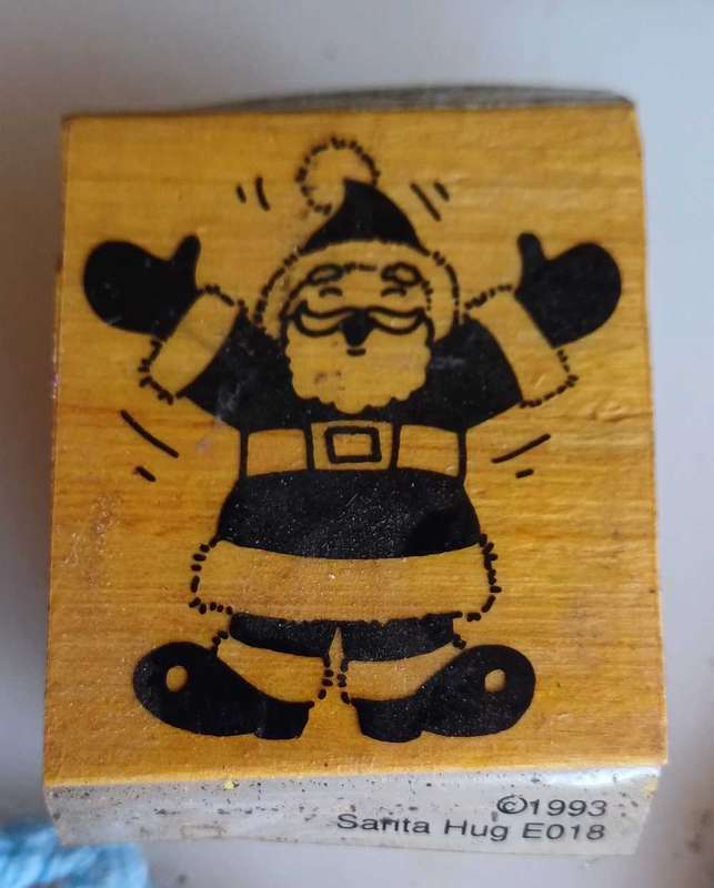 Santa hug rubber stamp