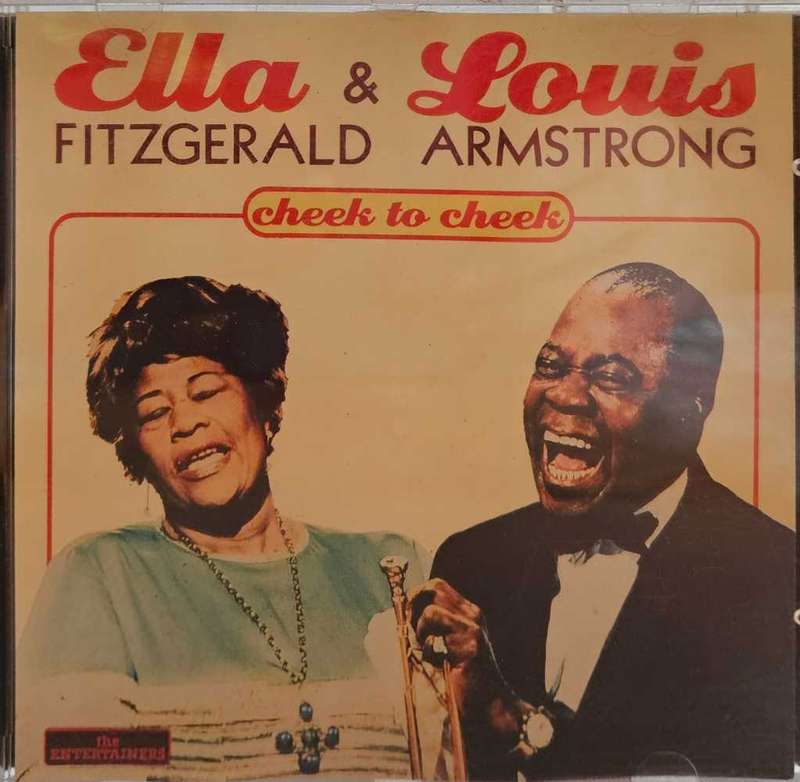 Ella Fitzgerald and Louis Armstrong cheek to cheek   77