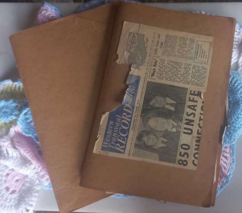 2 x Books with vintage newspaper clippings