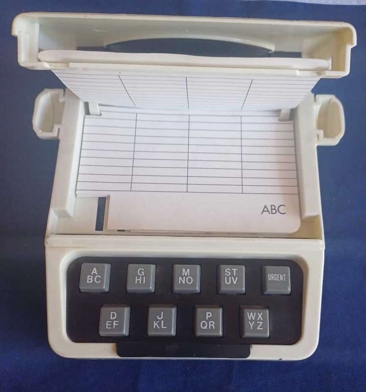 Vintage phonedex typewriter telephone index push button directory 1986