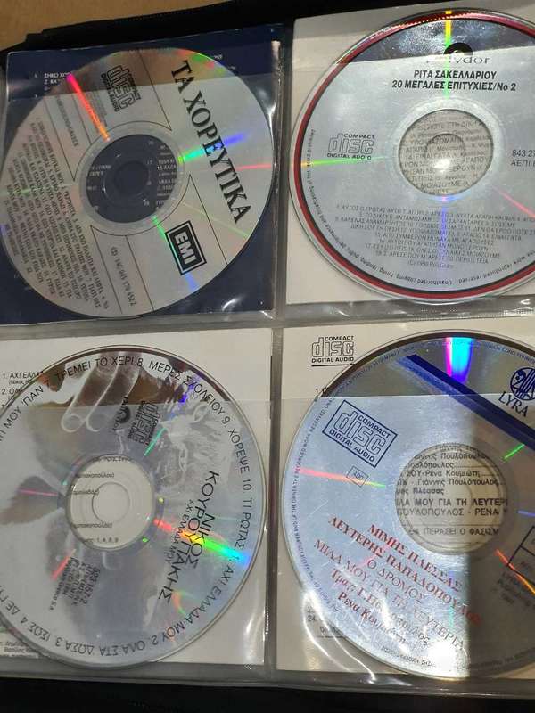 80+ Greek cd`s in Pouch