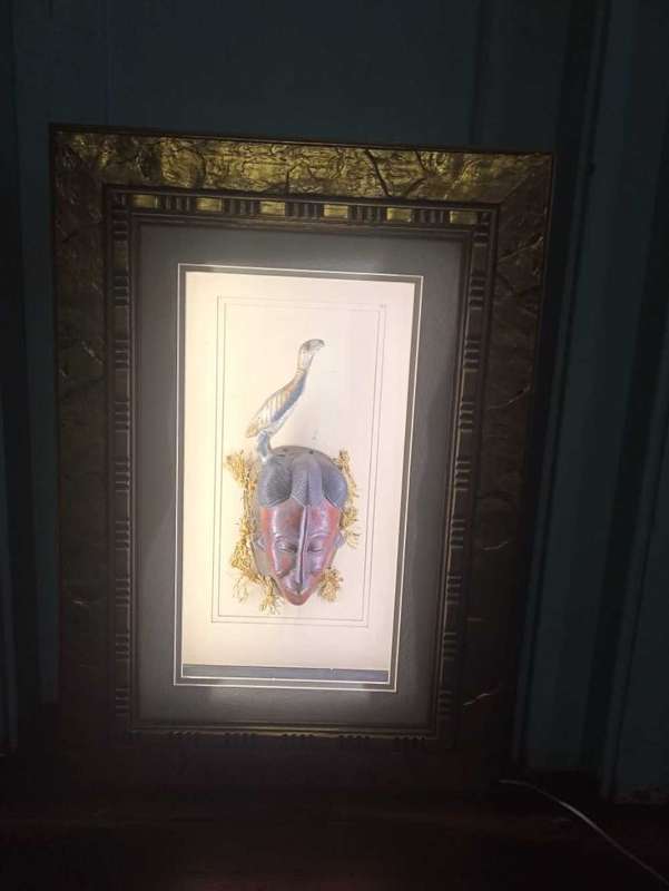 Foreign art sculpture framed