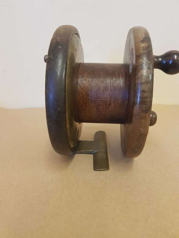 Millward frogback wooden fishing reel. Used in early 1900s