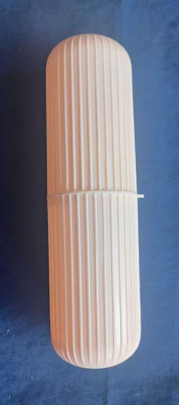 Travel toothpaste/toothbrush holder