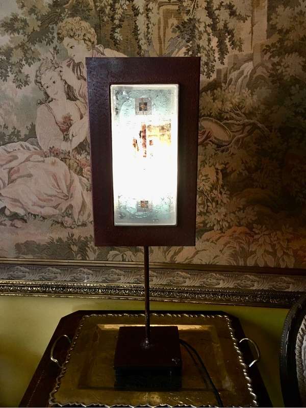 Copper colour metal table lamp with decorative glass panel
