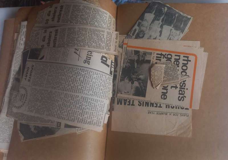 2 x Books with vintage newspaper clippings