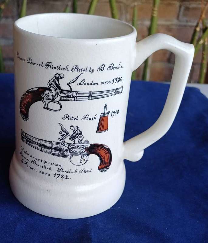 Canon barrel flintlock pistol cup