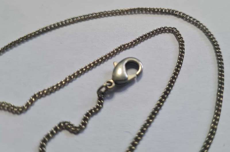 Necklace with crusifix pendant