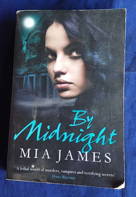 By midnight by Mia James
