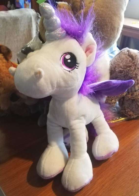 Ponytail Unicorn with long mane and purple wings. Plush Unicorn by Keel Toys. 30cm.