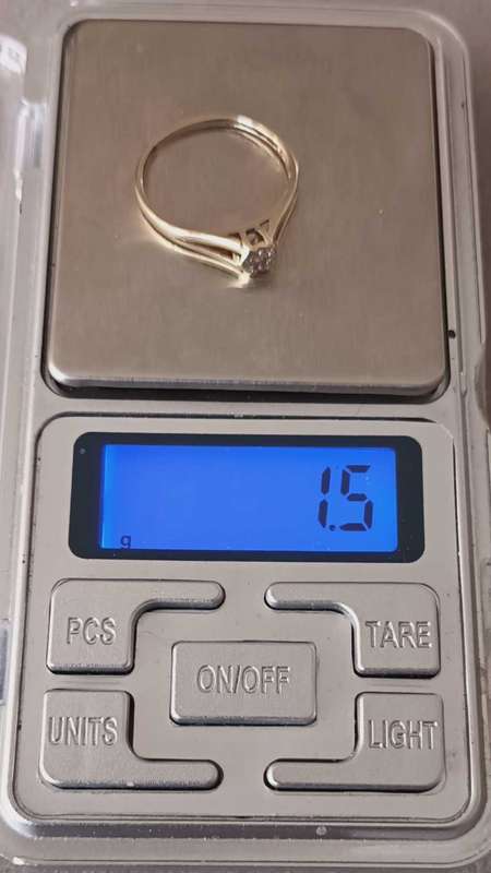 9ct White Gold Ring with .09ct Diamond. Valued at R7499. Certificate included.