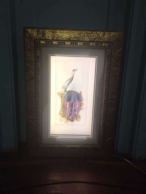 Foreign art sculpture framed