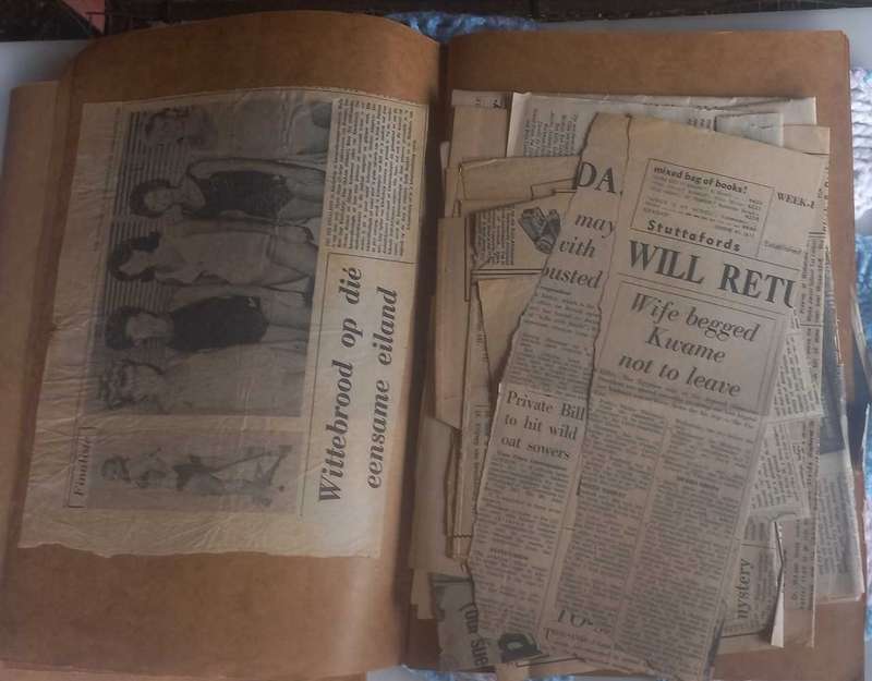 2 x Books with vintage newspaper clippings