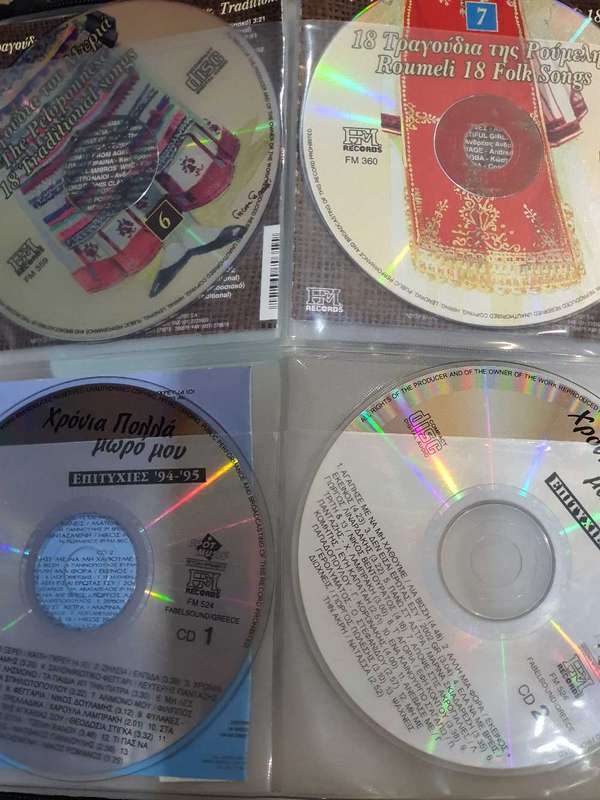 80+ Greek cd`s in Pouch
