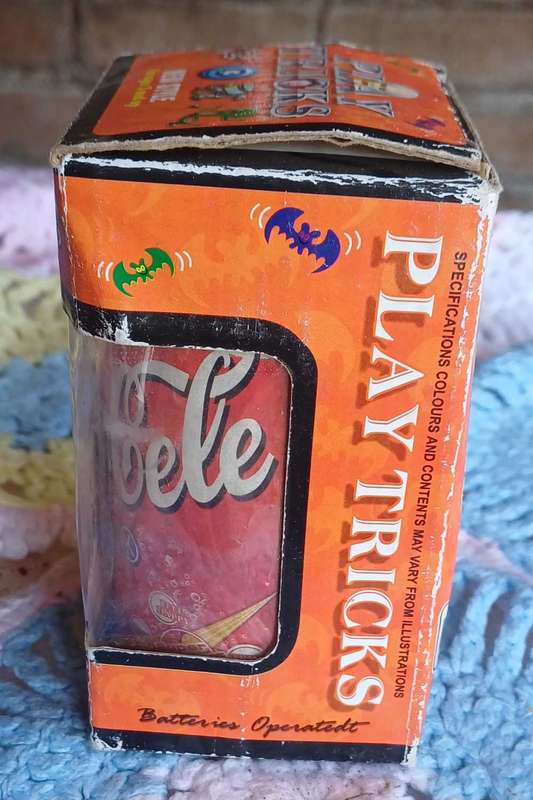 Tricky Coke tin