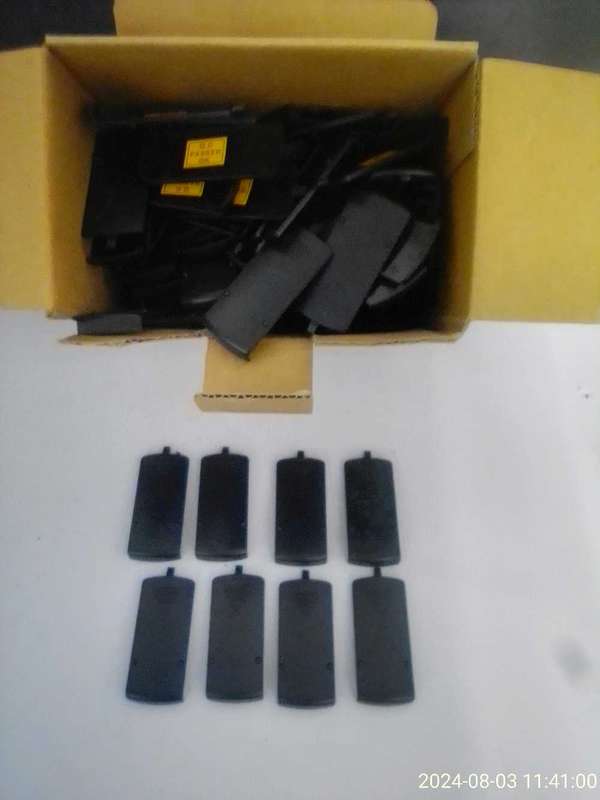 TELEFUNKEN REMOTE CONTROL BATTERY COVERS.  BOX FULL.  OVER 160 PIECES.