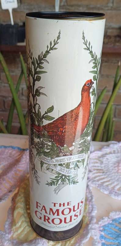 The famouse grouse tin (empty)