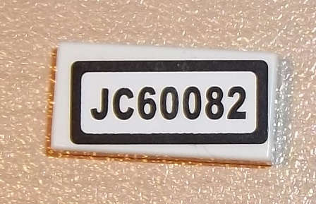 Lego (U) ~ Tile 1 x 2 with 'JC60082' Pattern (Sticker) - Set 60082 ~ [White]