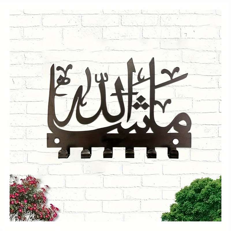 A charming Islamicinspired key holder that combines storage and towelhanging functions