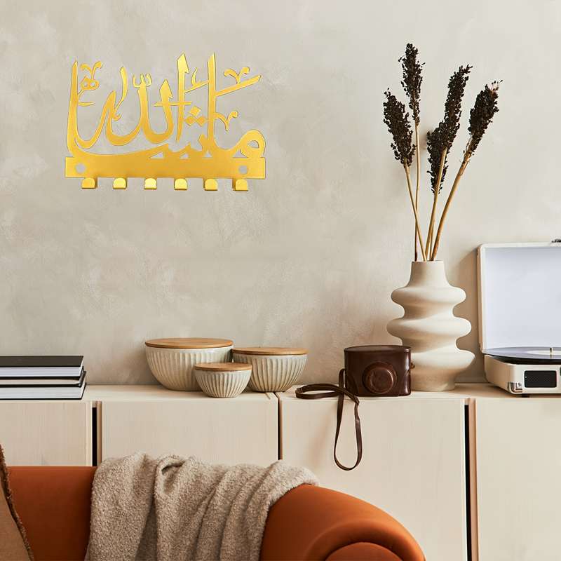 A charming Islamicinspired key holder that combines storage and towelhanging functions