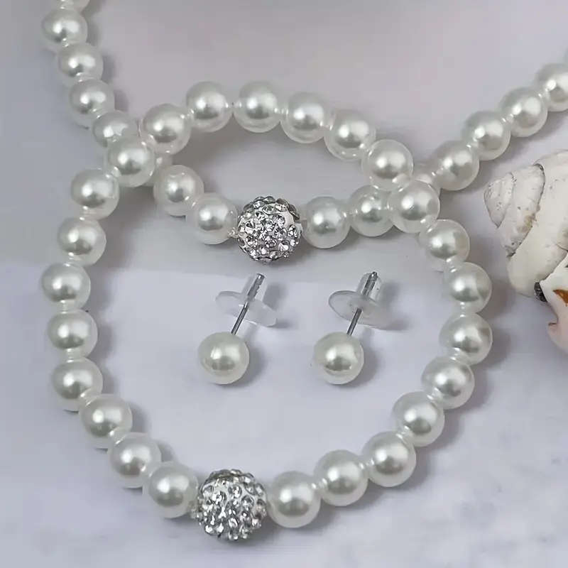 1 necklace + 1 bracelet + 2 earrings. Elegant and minimalist faux Imitation Pearl jewelry set