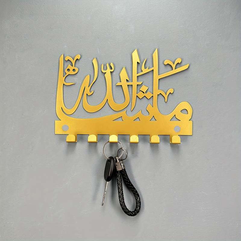 A charming Islamicinspired key holder that combines storage and towelhanging functions
