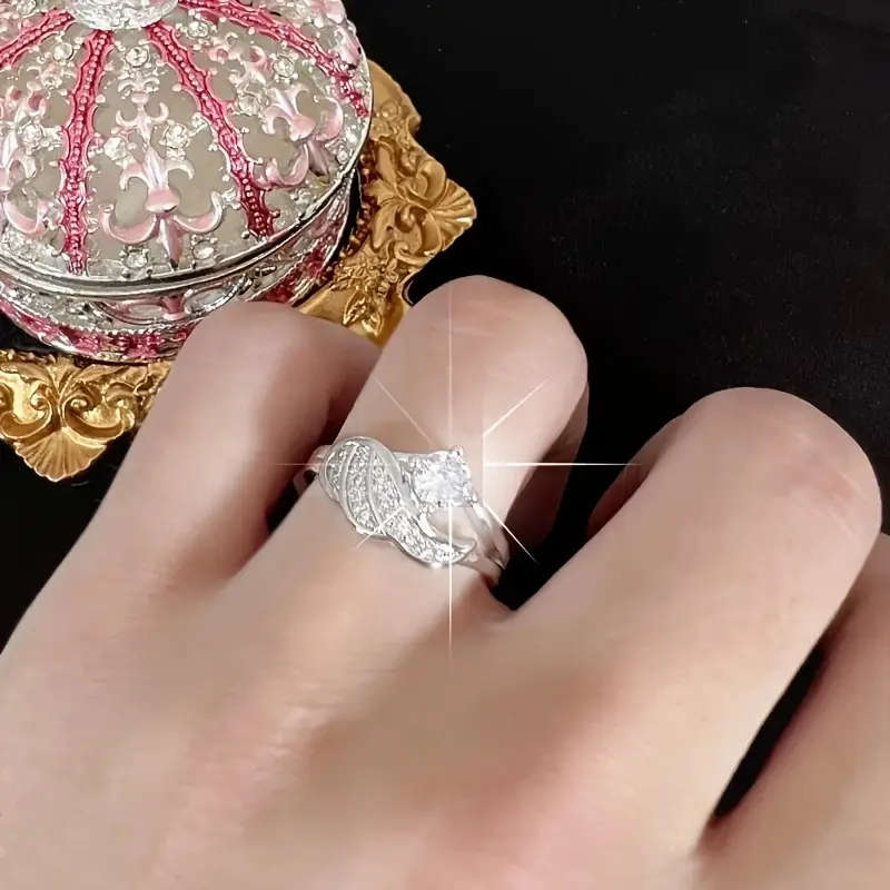 Wing shaped 925 Silver Inlaid Synthetic Zirconia Ring with adjustable size