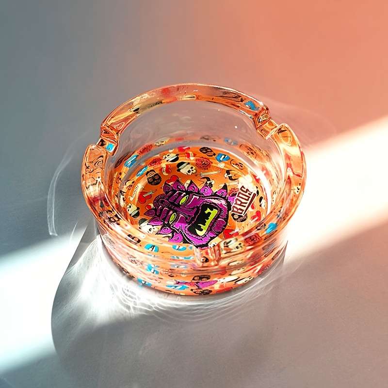 1pc Creative Patterned Glass Ashtray Round Transparent Design with Vibrant Monster Graffiti
