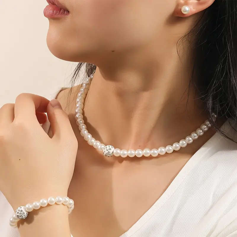 1 necklace + 1 bracelet + 2 earrings. Elegant and minimalist faux Imitation Pearl jewelry set