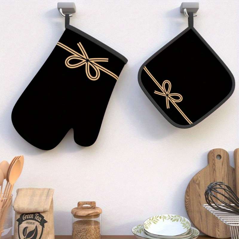 Set of 2 Heat-Resistant Oven Mitts And Pot Holders in Black Bow String Design Measuring 10.6 b