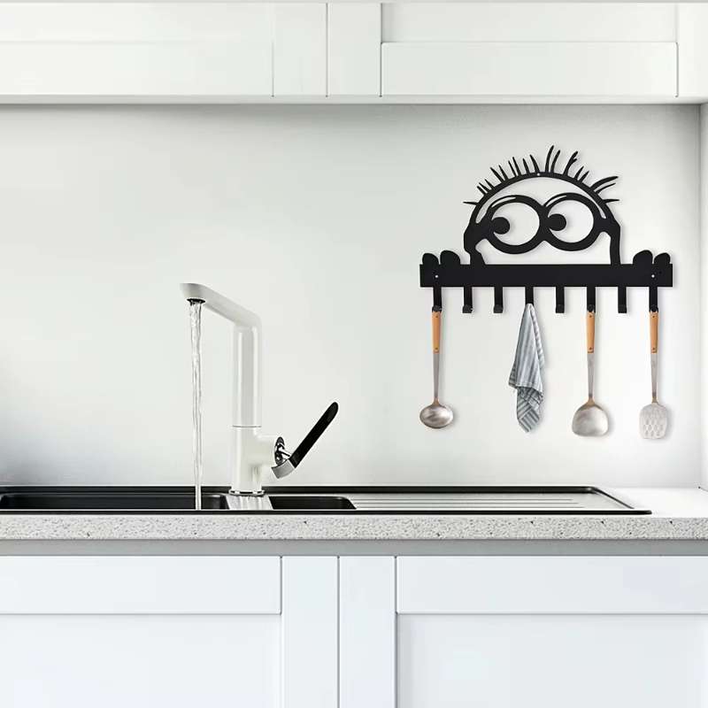 A single set of elegant wallmounted metal coat hooks with 8 hooks. Its a practical and stylish c