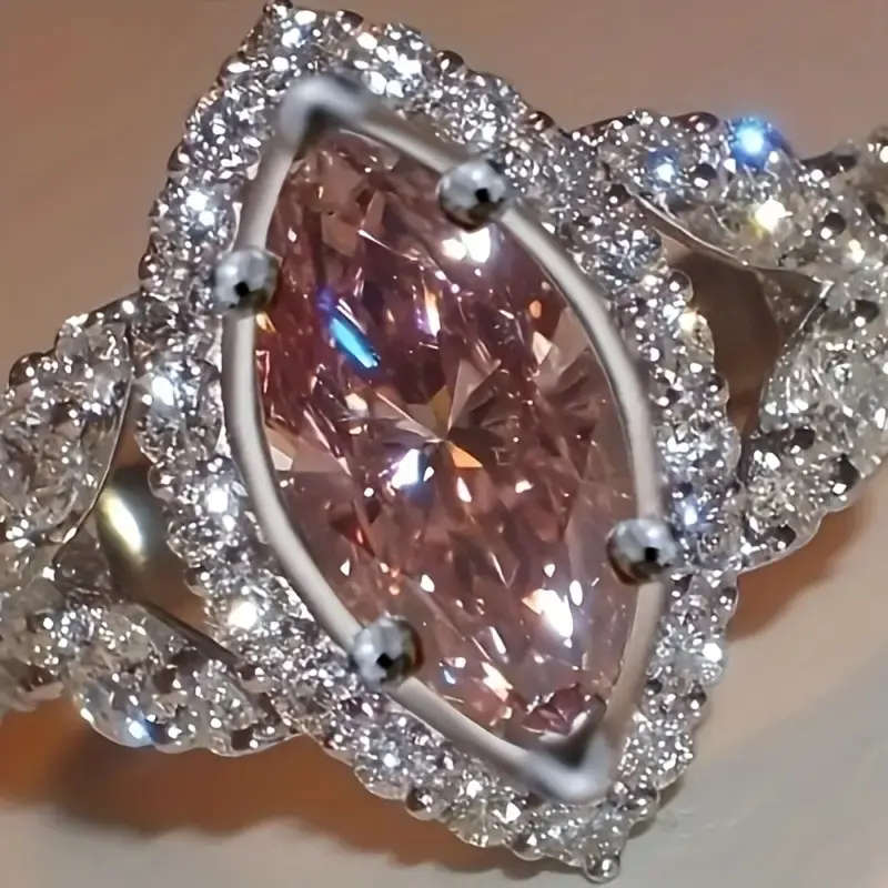 Four-Prong Eye Cut with Pink Synthetic Ring