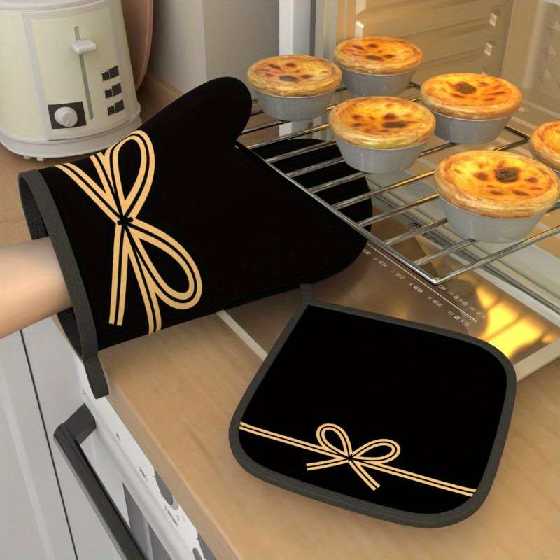 Set of 2 Heat-Resistant Oven Mitts And Pot Holders in Black Bow String Design Measuring 10.6 b