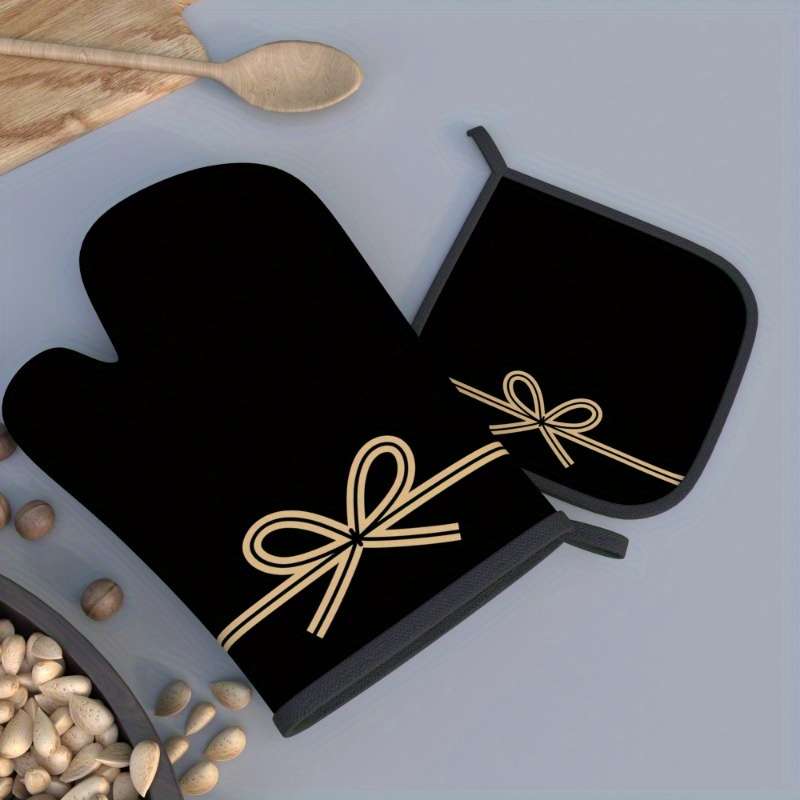 Set of 2 Heat-Resistant Oven Mitts And Pot Holders in Black Bow String Design Measuring 10.6 b