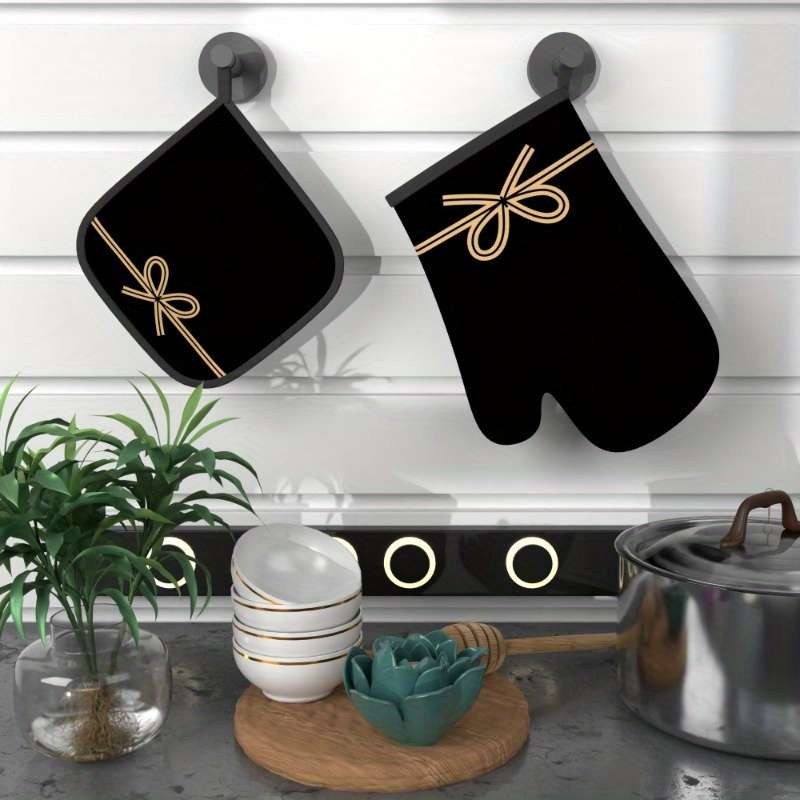 Set of 2 Heat-Resistant Oven Mitts And Pot Holders in Black Bow String Design Measuring 10.6 b